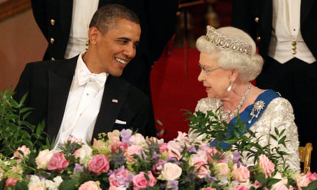 Barack Obama speaks with Queen Elizabeth during a state banquet at Buckingham Palace.