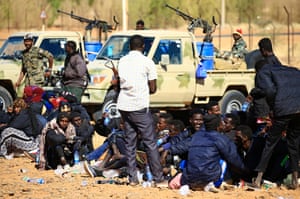 Migrants from Somalia and Ethiopia are detained in Omdourman, on the western outskirts of the capital Khartoum, after Sudanese forces caught them travelling illegally on the Libyan-Sudan border on January 8, 2017.