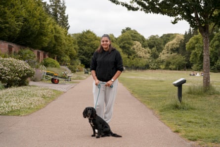 Naiya Ghuman with her black dog in Bute Park