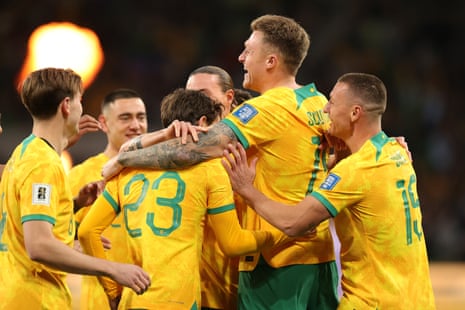 Harry Souttar celebrates his goal with teammates.