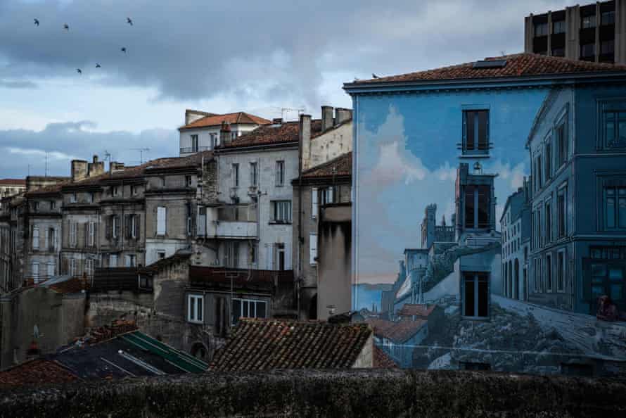 A mural entitled La Fille des Remparts after a drawing by French comic artist Max Cabanes in Angoulême.