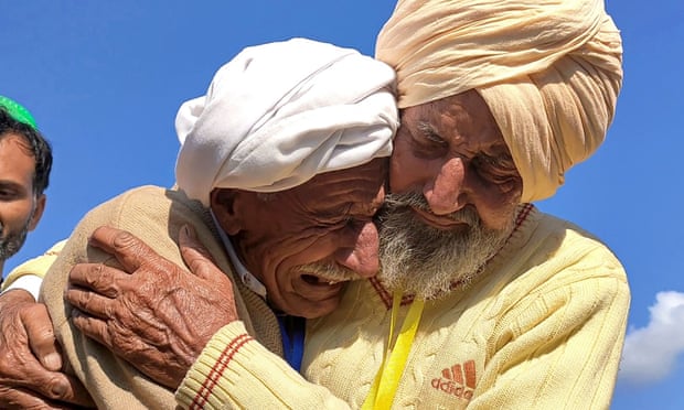 Sadiq and Sikka Khan embrace