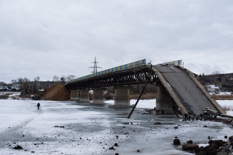 A view of a destroyed bridge spanning the Oskil river in Kharkiv region.