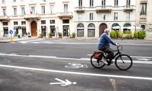 A cyclist in a new bike lane in Milan