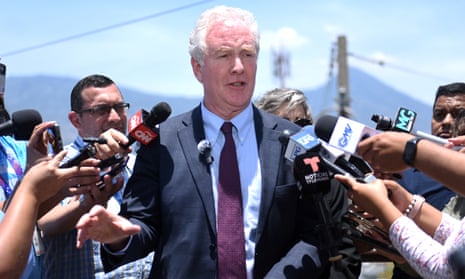 a man surrounded by microphones
