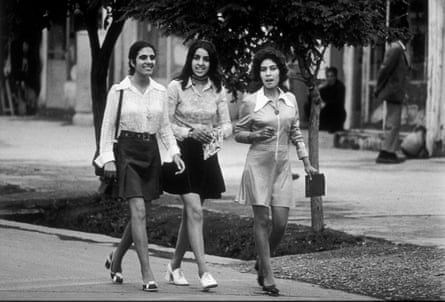 Young women wearing mini-skirts walking down the street in the city of Kabul, 1972.