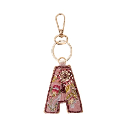 Monsoon Embellished Floral Initial Keyring Pink. A decorative textile capital ‘A’ hangs from a keyring.
