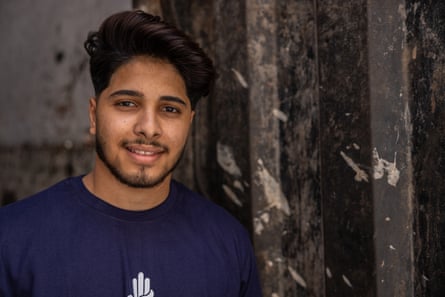 Portrait of a young man in a blue T-shirt
