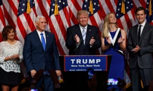 Donald Trump and Mike Pence appear with family members.
