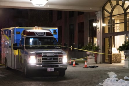 An ambulance parked outside the lobby of a building following a fatal shooting in Vaughan, Ontario, on Sunday.