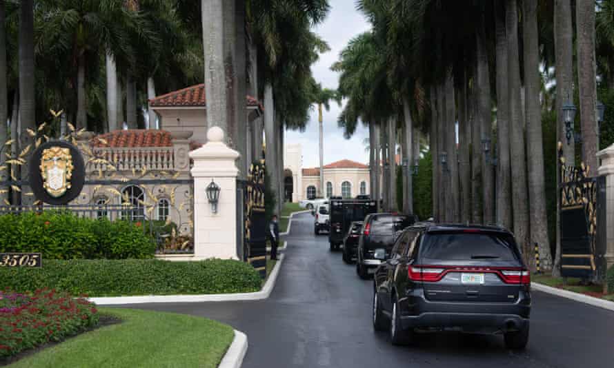 The presidential motorcade arrives at Trump International Golf Club in West Palm Beach.
