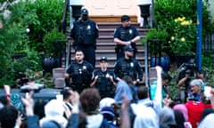 George Washington University Students Continue To Protest Against The War In Gaza<br>WASHINGTON, DC - MAY 9: George Washington University police officers stand on the steps of The F Street House, which has long served as the home of the President, as Pro-Palestinian demonstrators marched from H Street near the now fenced off University Yard at George Washington University on May 9, 2024 in Washington, DC. The Pro-Palestinian encampment that occupied GWU's University Yard for two weeks was cleared by police officers from the Metropolitan Police Department of the District of Columbia in the pre-dawn hours of May 8th, with more than 30 people being arrested, hours before DC Mayor Muriel Bowser was scheduled to testify before the House Oversight Committee. (Photo by Kent Nishimura/Getty Images)