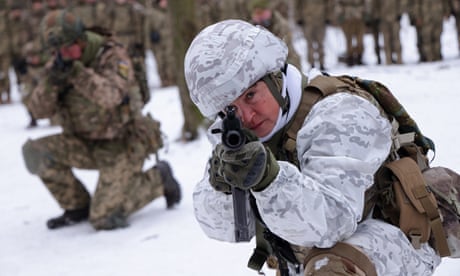 A Kyiv Territorial Defence unit goes through training on Saturday.
