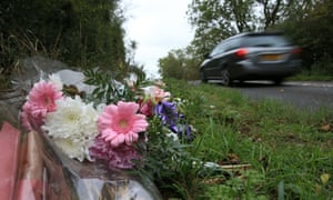 Floral tributes lay on the roadside near RAF Croughton in Northamptonshire, central England on October 10, 2019, at the spot where British motorcyclist Harry Dunn was killed as he travelled along the B4031 on August 27. - A court in London rejected a claim against the UK government on November 24, 2020 filed by the parents of a teenager killed in a crash with an American woman. Harry Dunn, 19, died in August last year after his motorbike crashed into a car driven by Anne Sacoolas, the wife of a US technical assistant working at a British air base.
