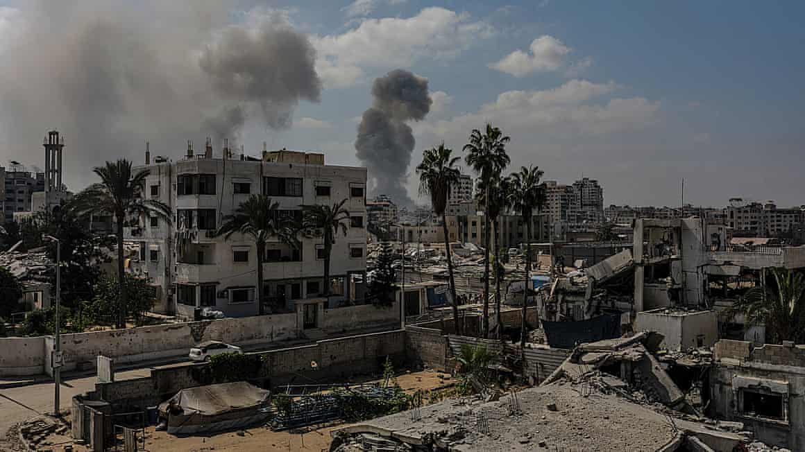 Smoke rises after an Israeli airstrike in Gaza City on Tuesday.