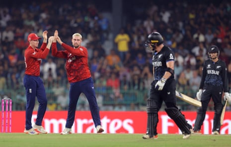 England's Will Jacks and Harry Brook (left) celebrate after taking the wicket of New Zealand's Glenn Phillips.