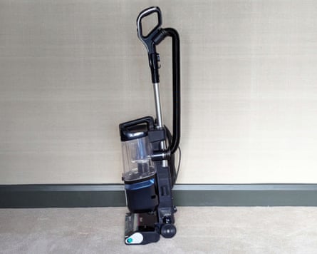Shark Detect Lift-Away XL LA791UKT Upright Bagless Vacuum Cleaner photographed on grey living room carpet against a white/grey wall.