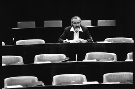 a man sits alone
