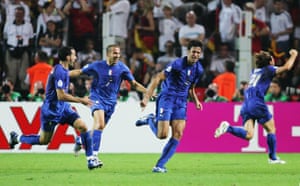 Fabio Grosso celebrates his extra time goal with Gianluca Zambrotta (left) and Alessandro Del Piero (second left).