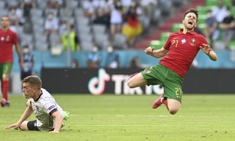 Portugal’s Diogo Jota is fouled by Germany’s Matthias Ginter.