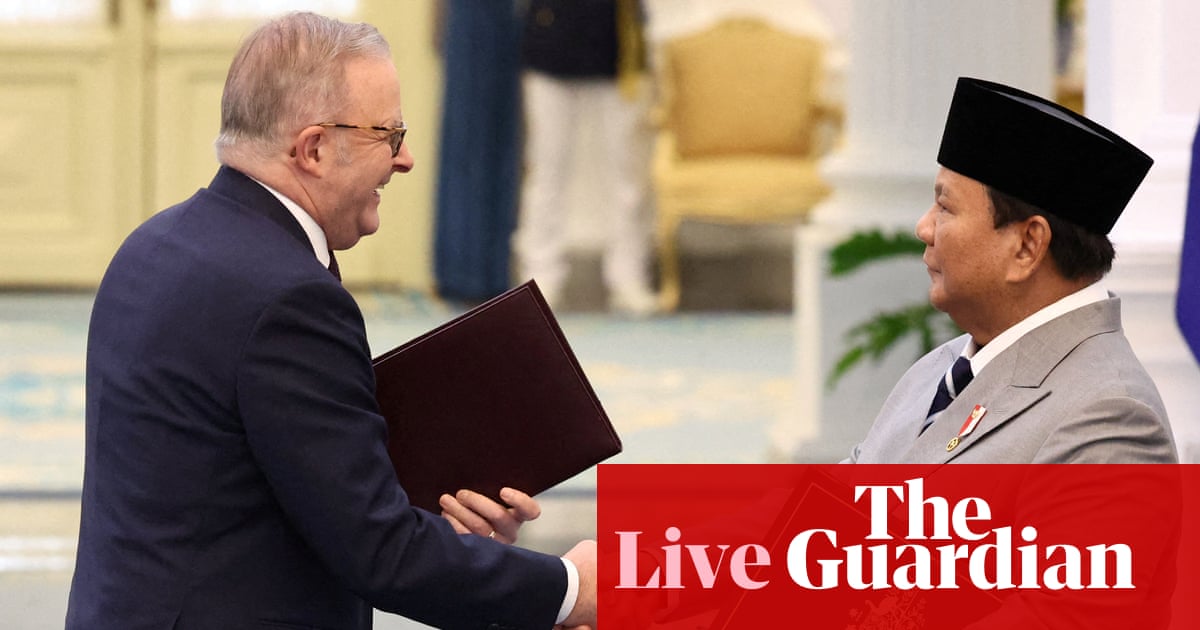 Australia news live: Albanese travels to Indonesia to sign ‘watershed’ security pact; NSW man charged after allegedly displaying Nazi symbols