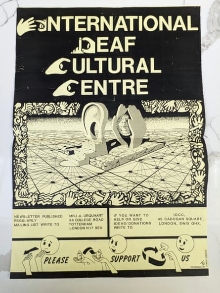 A poster for the International Deaf Cultural Centre features hands and ears over a spatial grid