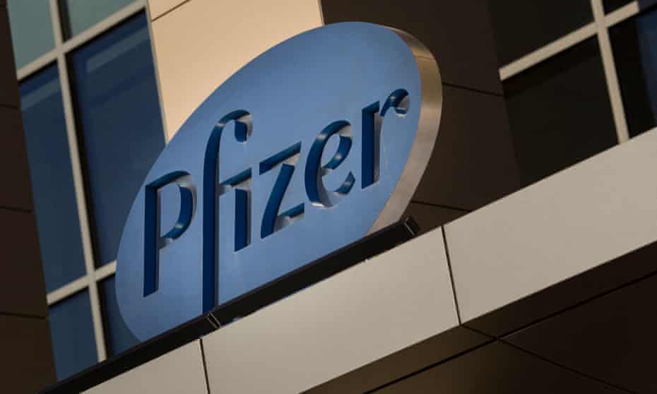 A sign for Pfizer pharmaceutical company is seen on a building