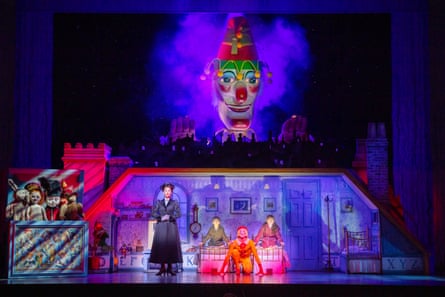 A puppet looms over the cast of Mary Poppins the Musical.