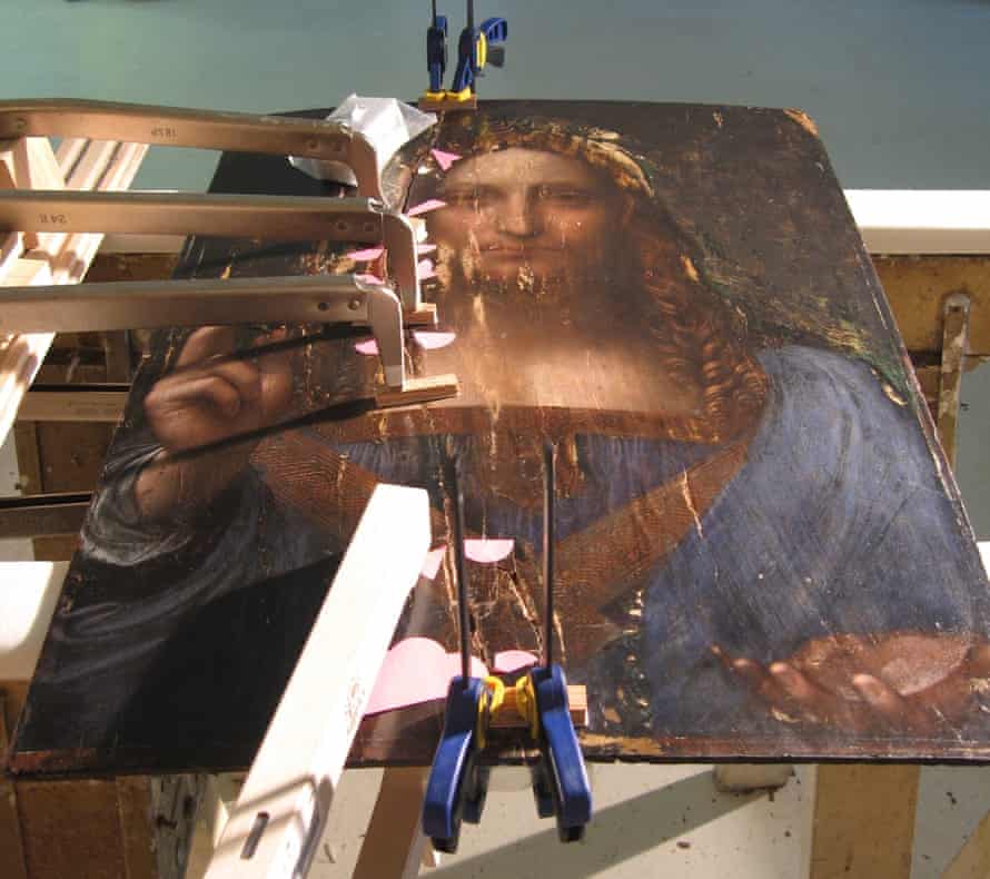 Cracked canvas … the work is shown being restored in The Lost Leonardo.