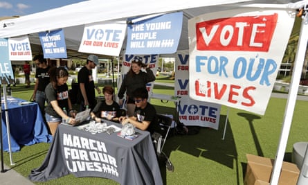 Student volunteers help out at a booth during a ‘Vote for our lives’ event at the University of Central Florida in Orlando, Florida.