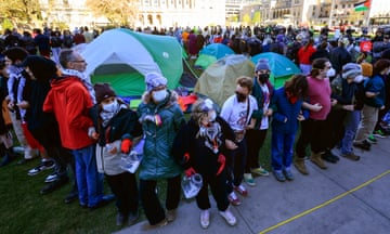 Protesters circle tent encampment on campus in Madison, Wisconsin 