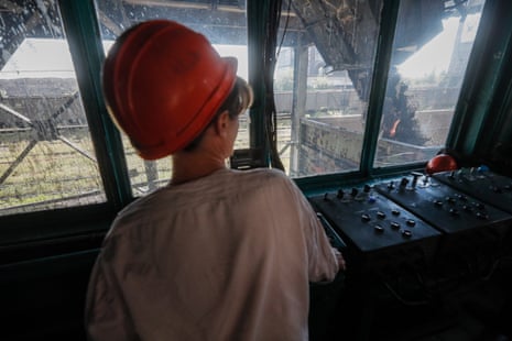 A miner supervising the loading of coal in Dolzhansk, occupied Luhansk.