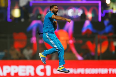 Shami celebrates the wicket of Ravindra