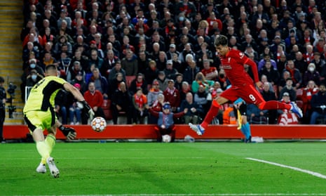 Liverpool’s Roberto Firmino scores their second goal.