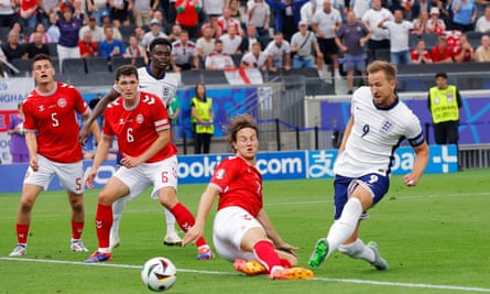 Harry Kane scores England’s goal against Denmark from close range.