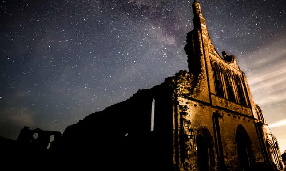 The Milky Way above Byland Abbey in the North York Moors national park. 
