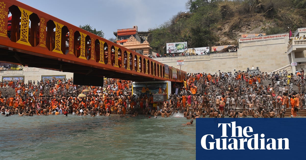 Ganges crowds highlight distancing challenges as Covid cases soar in India