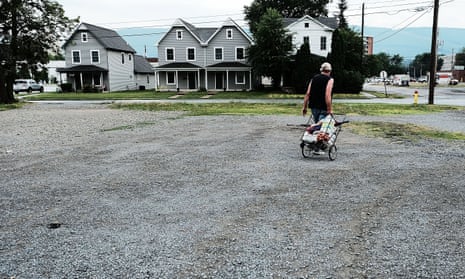 Small Central Pennsylvania Town Plagued By Poverty And Opioid Addiction<br>WILLIAMSPORT, PA - JULY 13: A man walks away from a food pantry operated by the American Rescue Workers in the struggling city of Williamsport, which has recently seen an epidemic of opioid use among its population on July 13, 2017 in Williamsport, Pennsylvania. The American Rescue Workers, which was founded in 1884, is a church/nonprofit national religious organization that runs a shelter, food pantry and operates businesses for the unemployed and homeless. With a population just over 29,000, Williamsport has a poverty rate of over 27%. As cities across the nation continue to cope with an epidemic of opioid use, often in areas with few employment prospects, Williamsport recently experienced 36 heroin overdoses in a 24 hour period. (Photo by Spencer Platt/Getty Images)