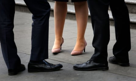 Men and a woman in office workwear