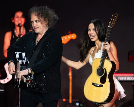 Rodrigo and Robert Smith on stage at Glastonbury in 2025.