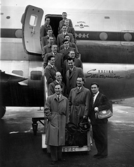 The MCC team, including Len Hutton (bottom left) posing on the steps of their plane in December 1953 before flying to the West Indies.