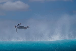 Tahiti, French PolynesiaThe US surfer Kelly Slater jumps into the water at Teahupo’o during the World Surf League Shiseido Tahiti pro-surfing event
