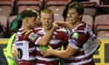 Zach Eckersley celebrates scoring Wigan’s winning try during their derby with local rivals St Helens.