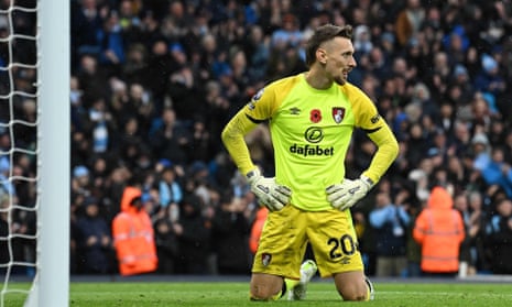 Bournemouth's goalkeeper Ionut Radu reacts after conceding a third goal against Manchester City.