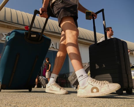 Evacuees from Israel arrive at Cyprus' main port of Limassol aboard the cruise ship Crown Iris, on Saturday, June 21, 2025.