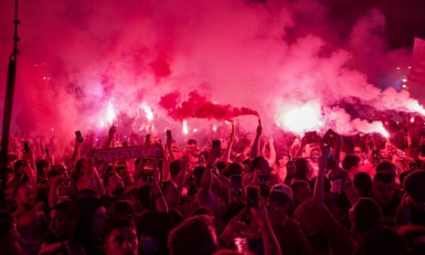Thousands of Olympiakos fans celebrate in streets after Europa Conference League win – video