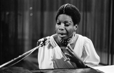 a women in front of a microphone