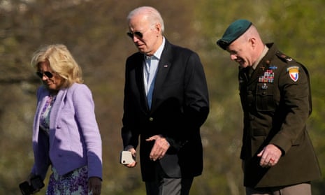U.S. President Joe Biden and first lady Jill Biden exit Marine One as they return from Camp David at Fort McNair on Sunday.