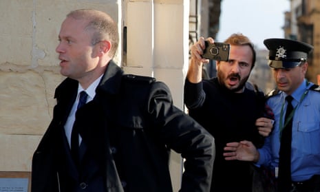 Malta’s prime minister Joseph Muscat arrives to meet members of the EU fact-finding mission at his office in Valletta.
