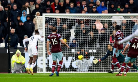 Wilfried Zaha scores Crystal Palace’s first goal against West Ham.